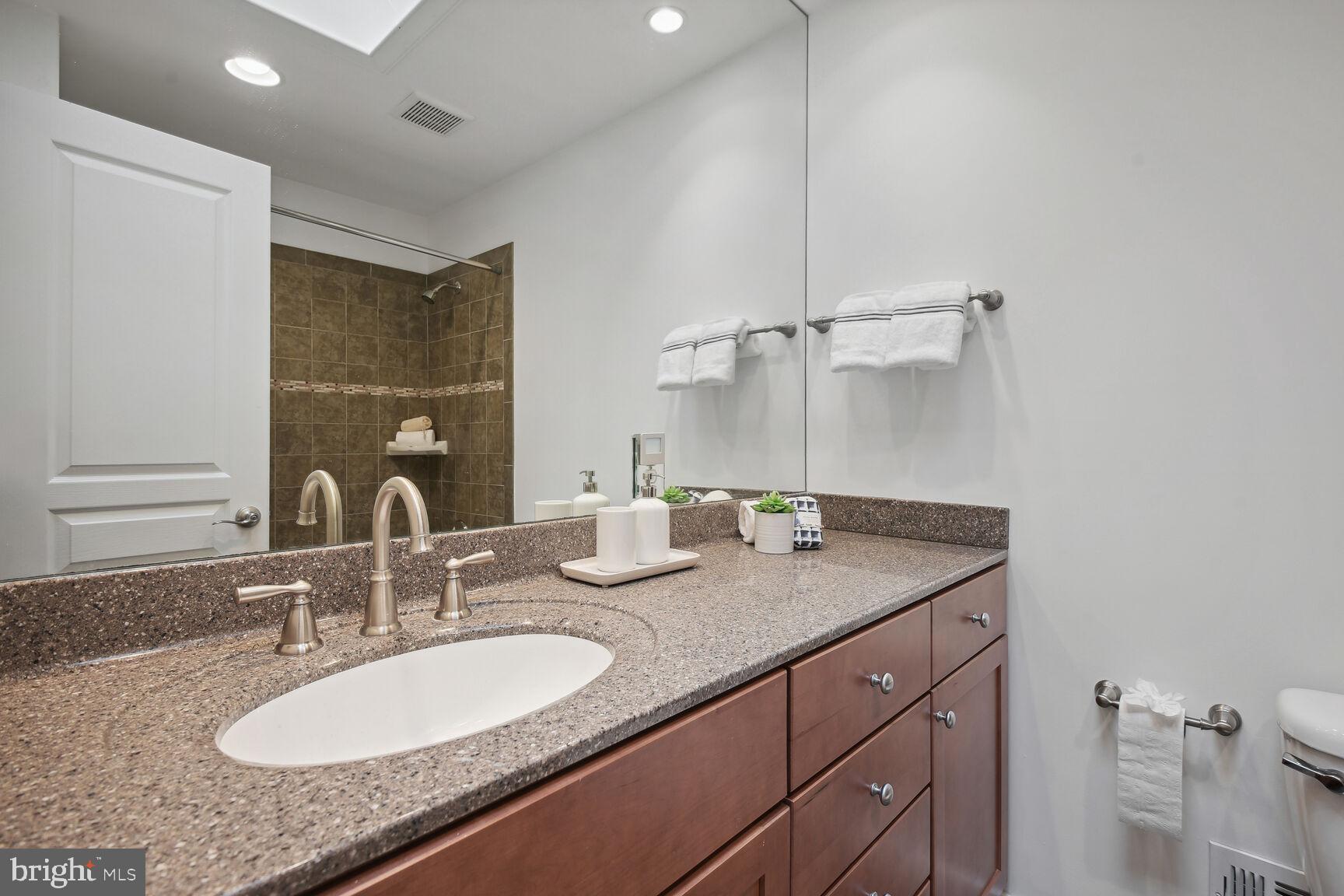 7705 Glenmore Spring Way Bethesda, MD 20817 - Photo 20 of 30 Main Floor Hall Bathroom