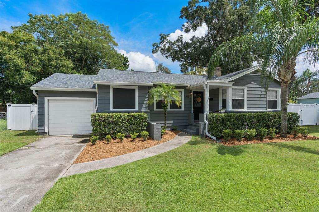 front view of a house with a yard