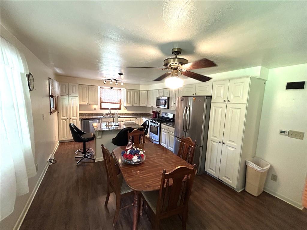 111 Iseman Road Freeport, PA 16229 - Photo 18 of 50 a view of a dining room with furniture and wooden floor