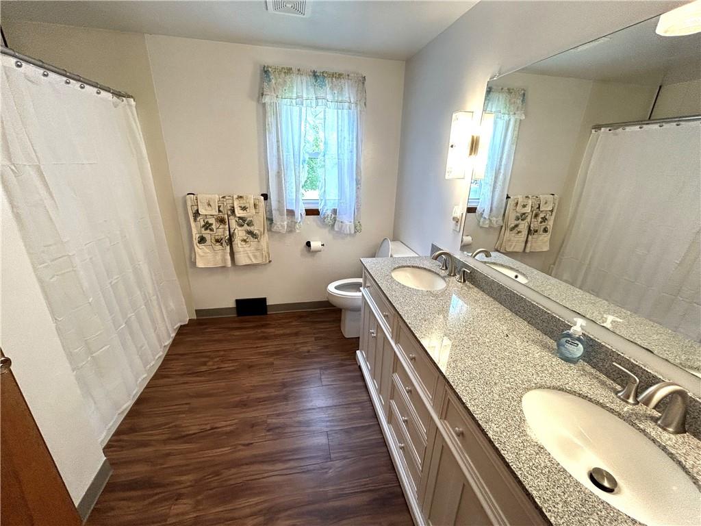 111 Iseman Road Freeport, PA 16229 - Photo 33 of 50 a spacious bathroom with a granite countertop double vanity sink a mirror and a shower