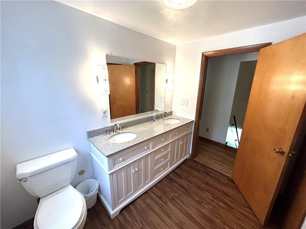111 Iseman Road Freeport, PA 16229 - Photo 34 of 50 a bathroom with a granite countertop toilet sink and mirror