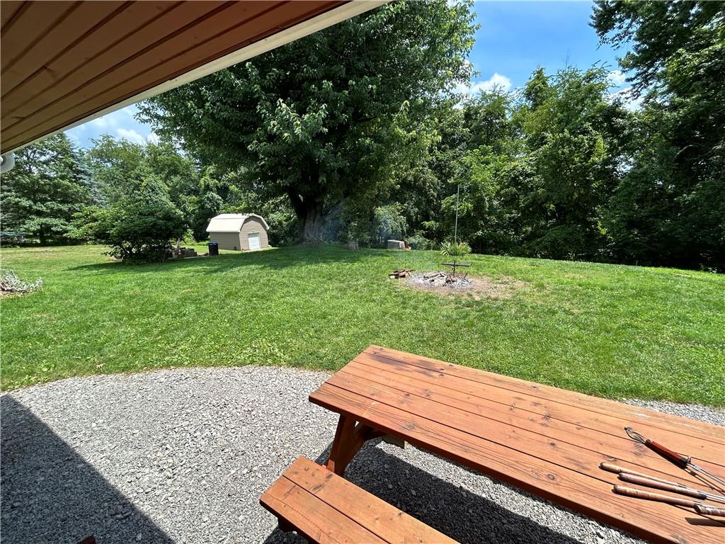 111 Iseman Road Freeport, PA 16229 - Photo 40 of 50 a view of a wooden bench sitting in a yard