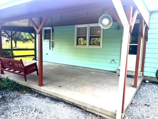 111 Iseman Road Freeport, PA 16229 - Photo 50 of 50 a view of a porch with furniture and a floor to ceiling window
