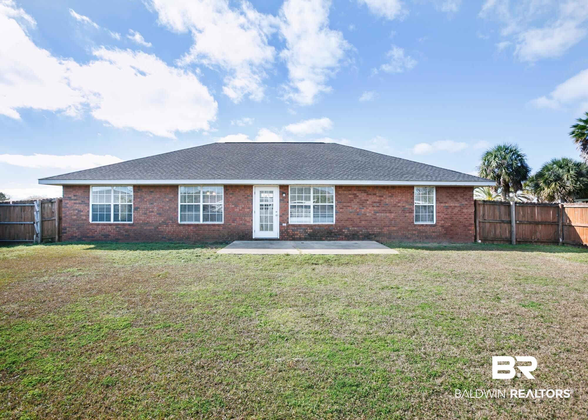 2530 Ashburn Lane Foley, AL 36535 - Photo 5 of 46 Single story home featuring a front yard and a patio area