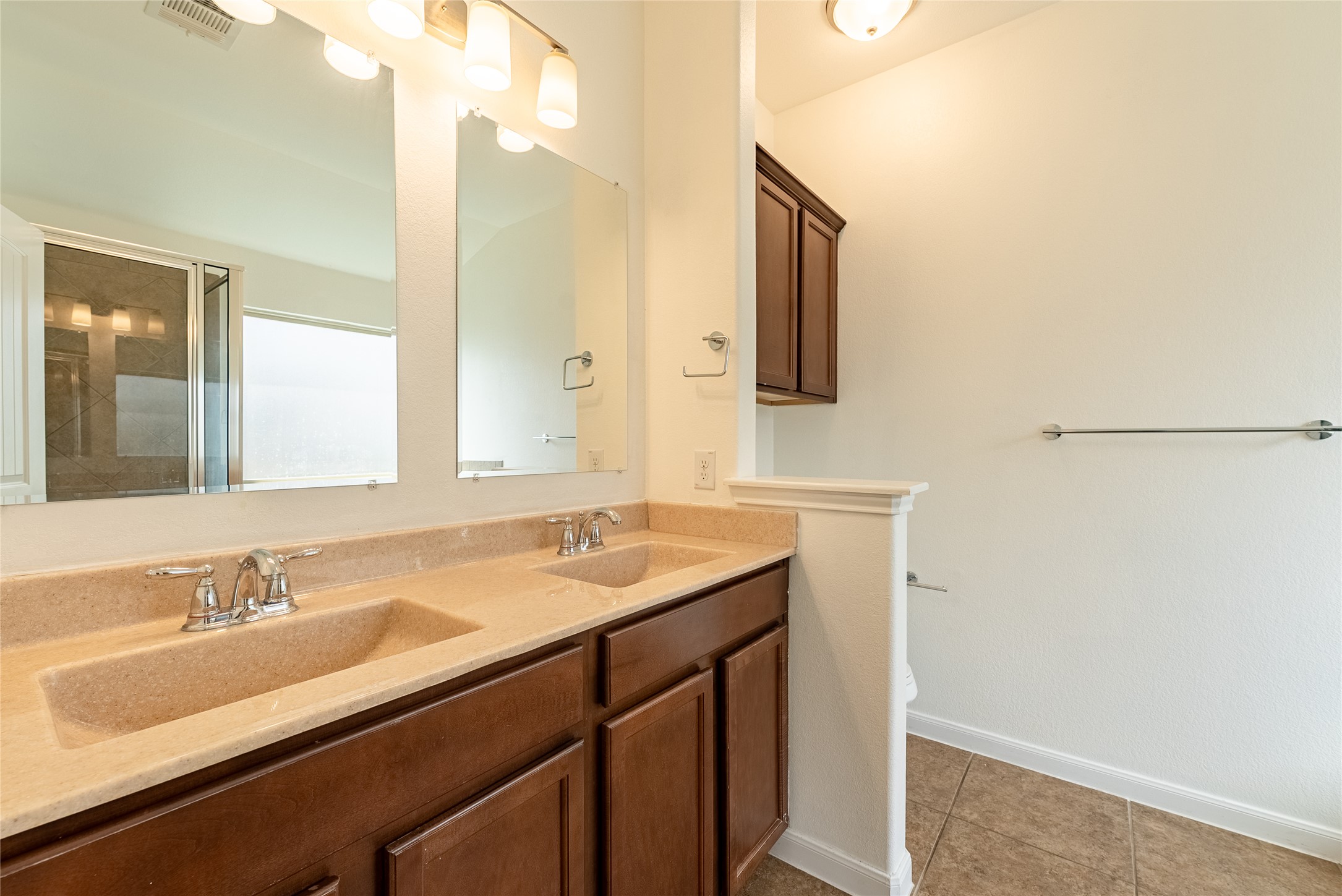 1437 April Meadows Loop Georgetown, TX 78626 - Photo 14 of 31 a bathroom with a sink and a mirror