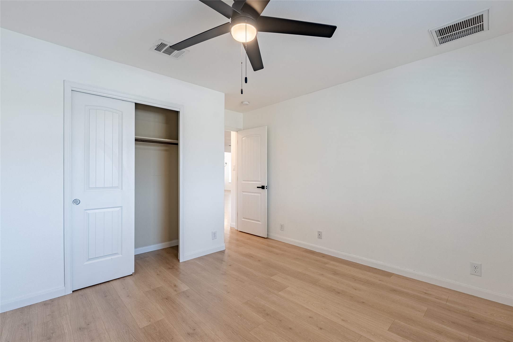 1437 April Meadows Loop Georgetown, TX 78626 - Photo 18 of 31 wooden floor in an empty room