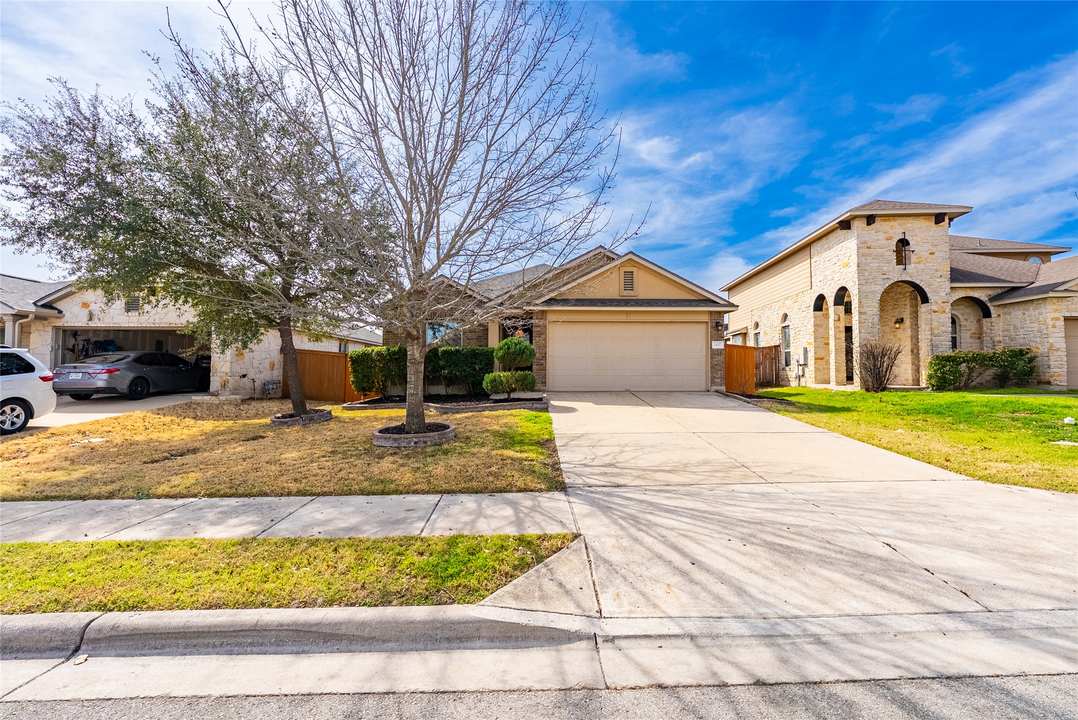 1437 April Meadows Loop Georgetown, TX 78626 - Photo 2 of 31 a front view of a house with a yard