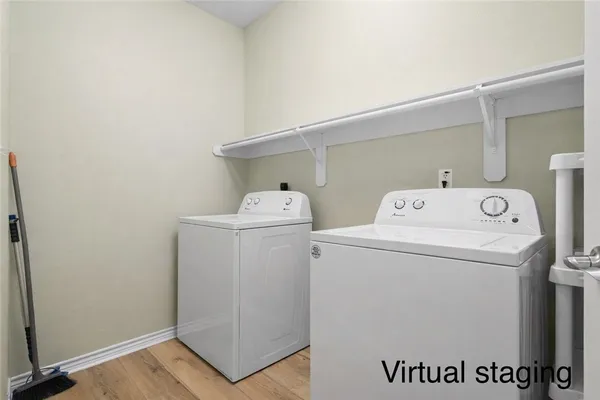 a utility room with dryer and washer