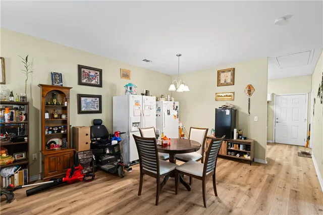 a view of a workspace with furniture and toys