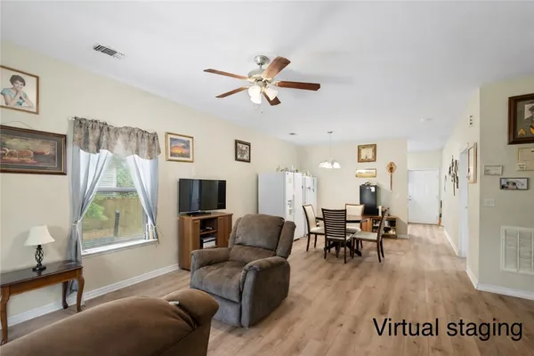 a living room with furniture and a window