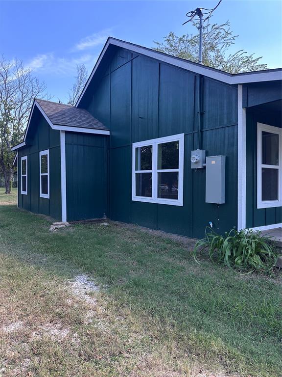 824 North Virginia Street Terrell, TX 75160 - Photo 20 of 21 a house with wooden fence