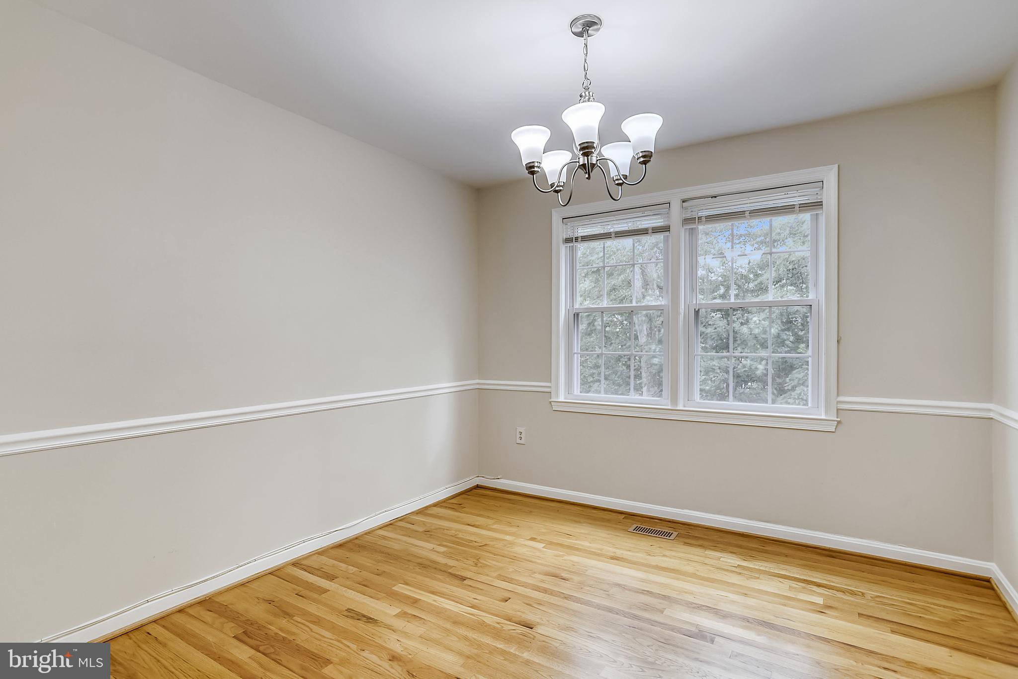 7025 Leebrad Street Springfield, VA 22151 - Photo 5 of 32 Dining room with hardwood floor.