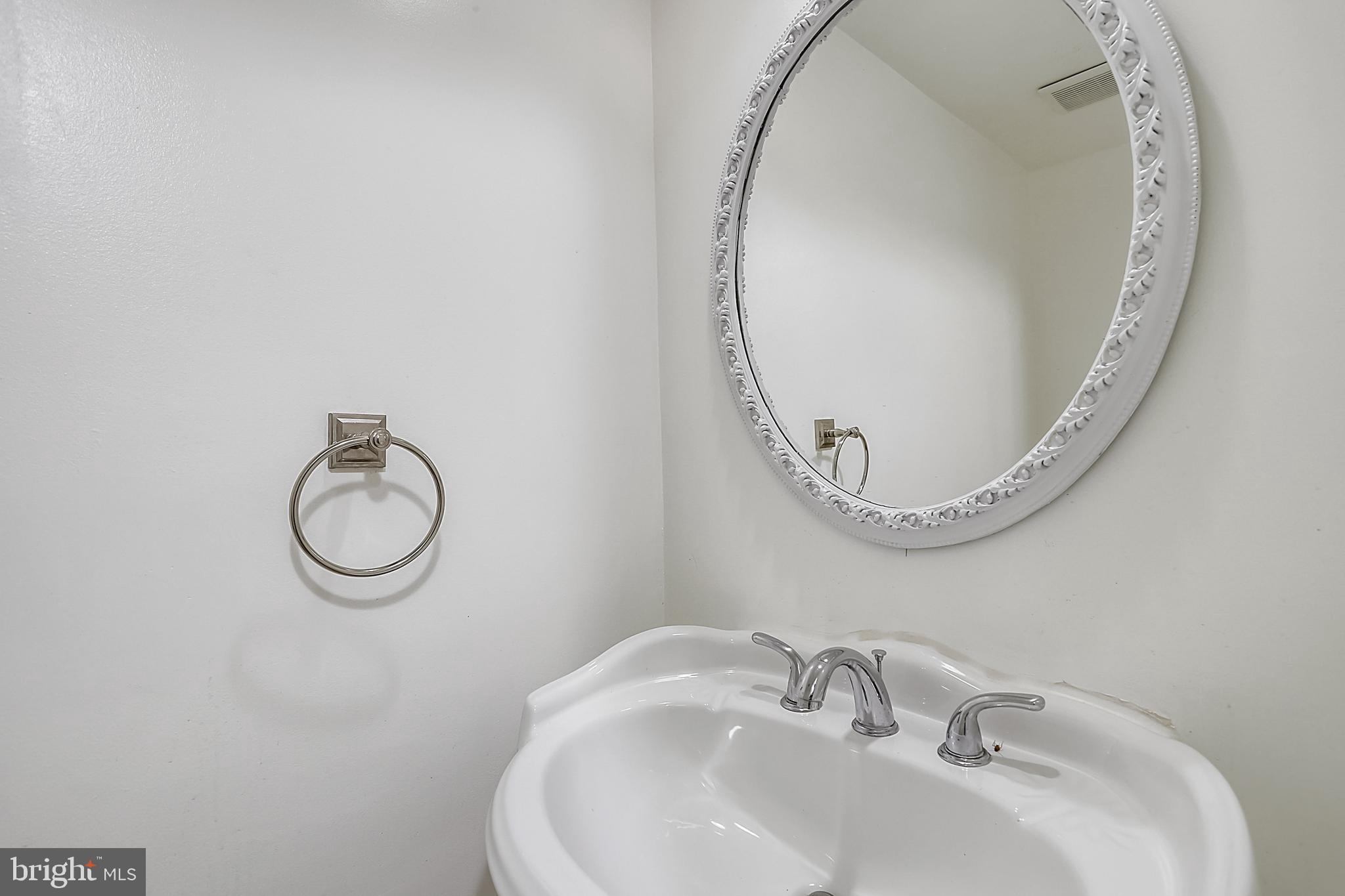 7025 Leebrad Street Springfield, VA 22151 - Photo 8 of 32 Main level powder room.