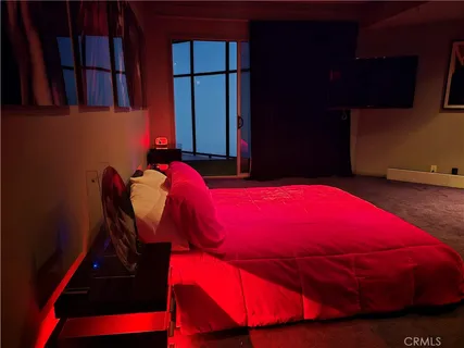 a bathroom with a toilet and shower