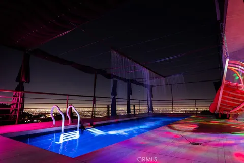 a outdoor space with pool and furniture