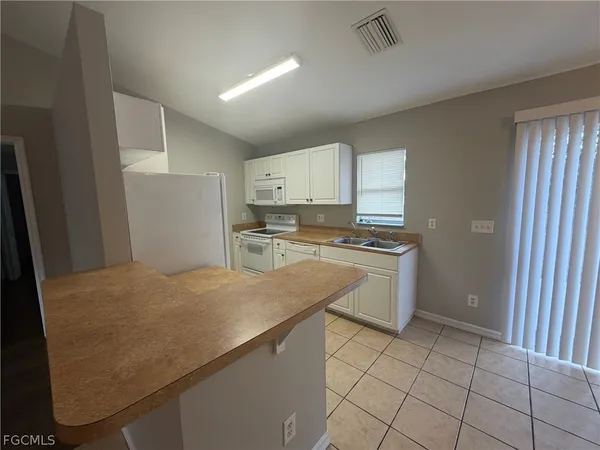 $1,805 | 4807 5th Street West, Lehigh Acres, FL 33971
