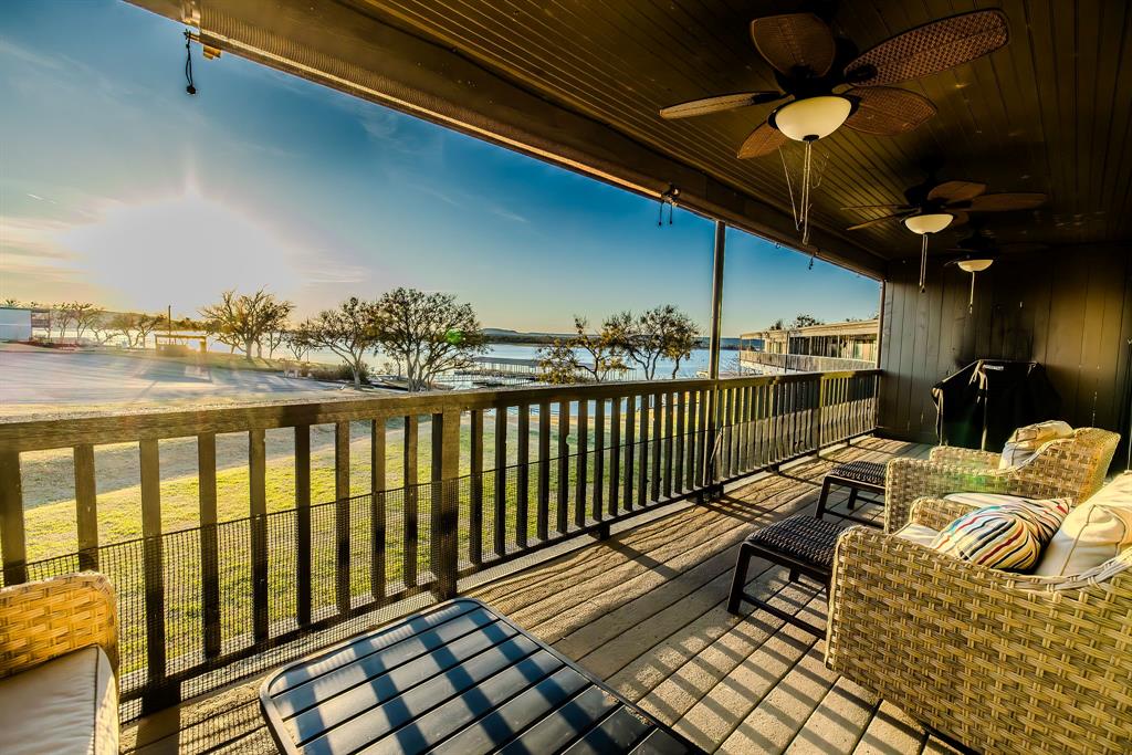 a view of balcony with furniture