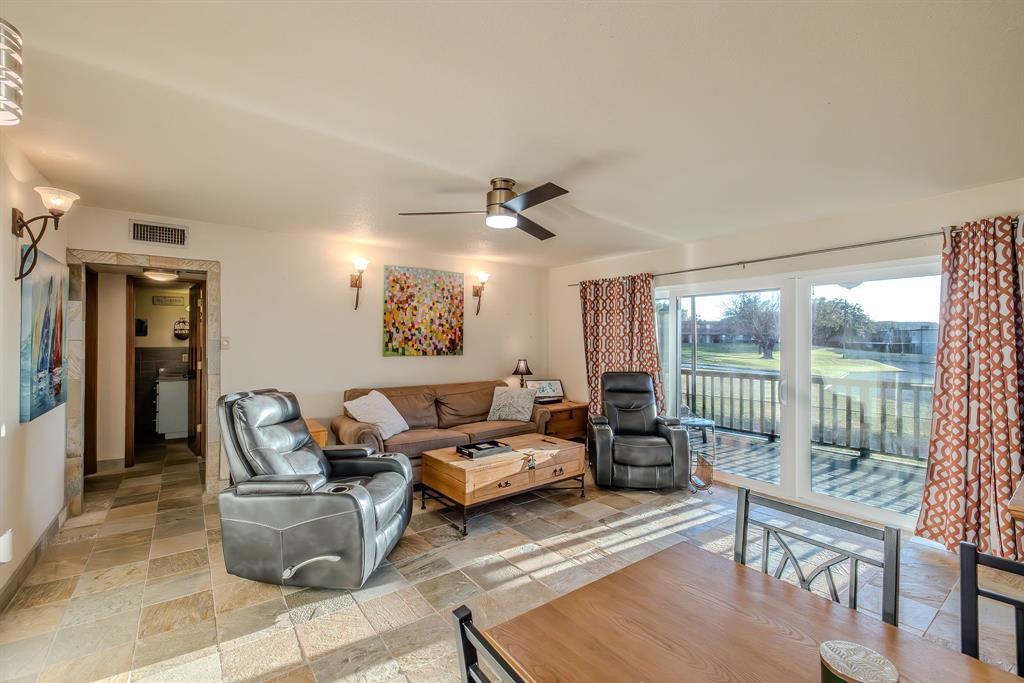1655 Cedar Crest Loop, Unit E7 Graford, TX 76449 - Photo 10 of 35 a living room with furniture