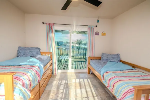 a bedroom with a bed and a dresser