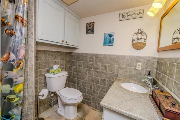 a bed room with a bed and a view of bedroom