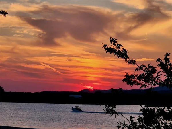 a view of a lake from a balcony