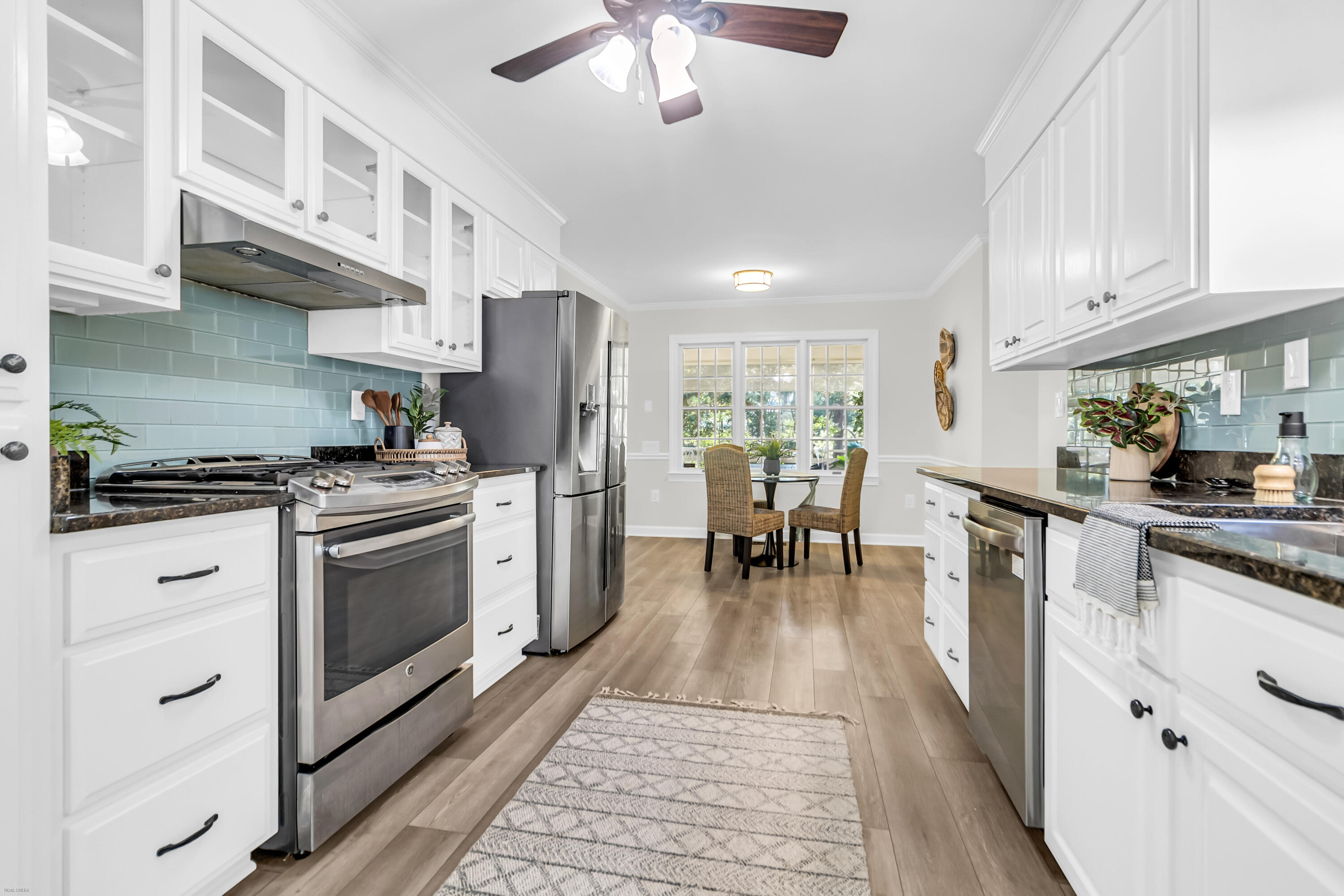568 Woodspring Road Mount Pleasant, SC 29466 - Photo 7 of 56 Updated kitchen with blue green tile