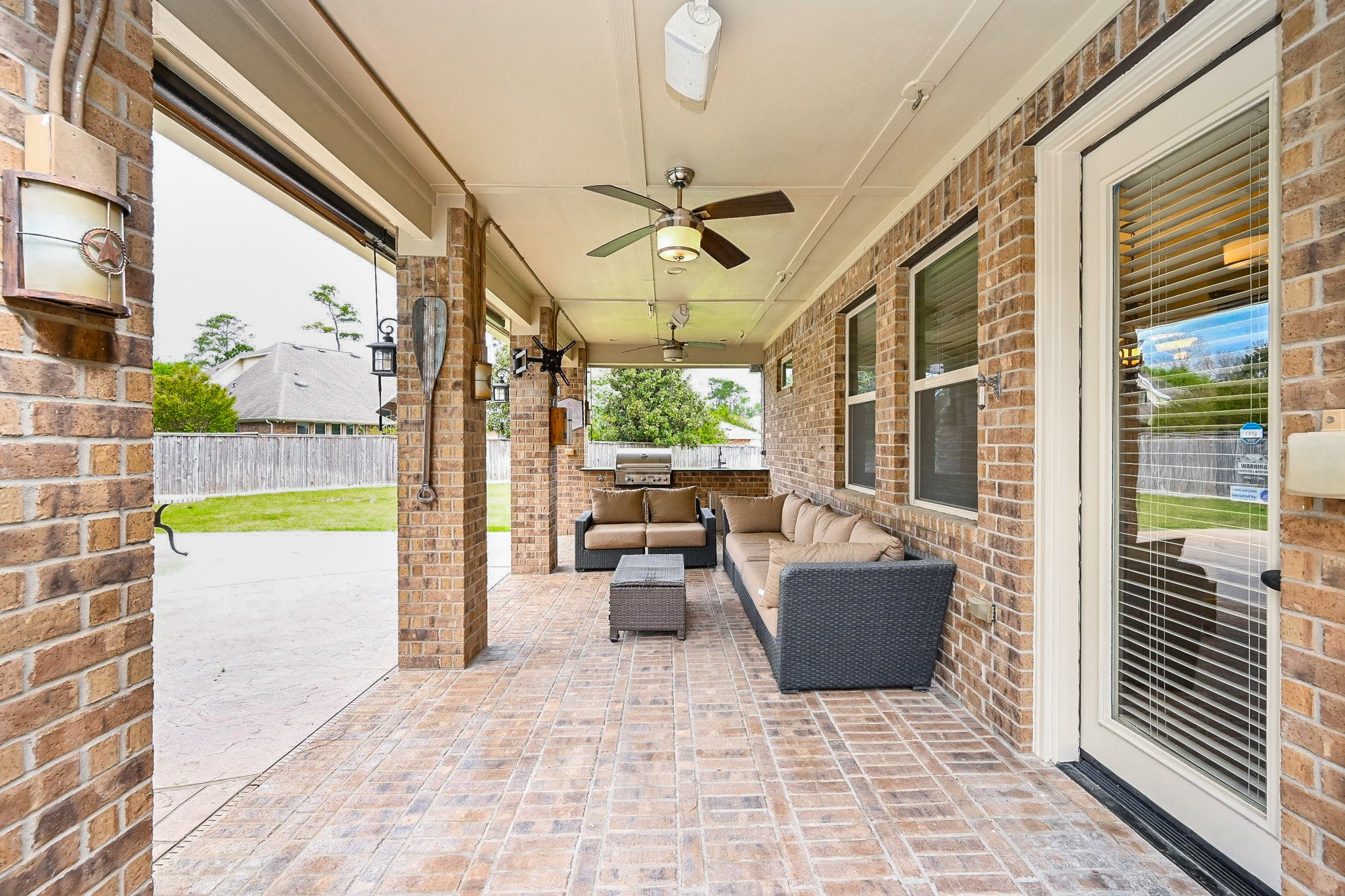 19 Sandwell Place Spring, TX 77389 - Photo 29 of 33 Spacious outdoor covered patio with ceiling fan for comfort, perfect for relaxing or entertaining