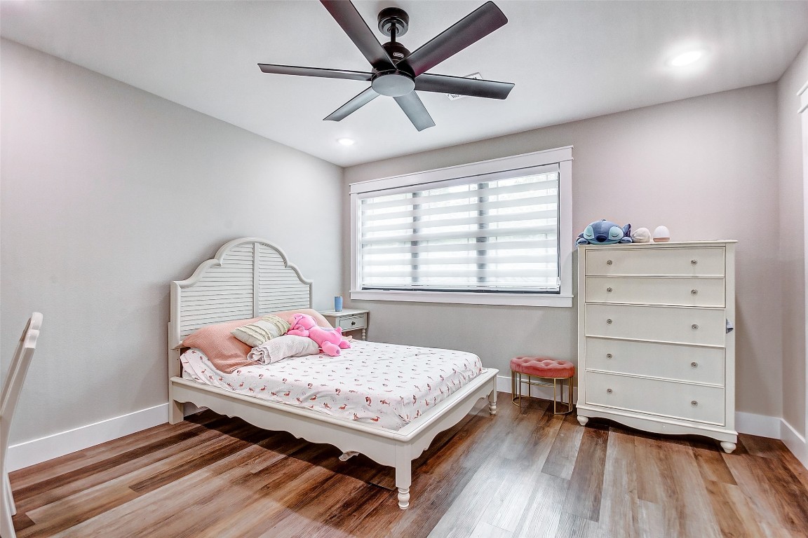 1345 Fm 3277 Livingston, TX 77351 - Photo 21 of 35 a bedroom with a bed and a window