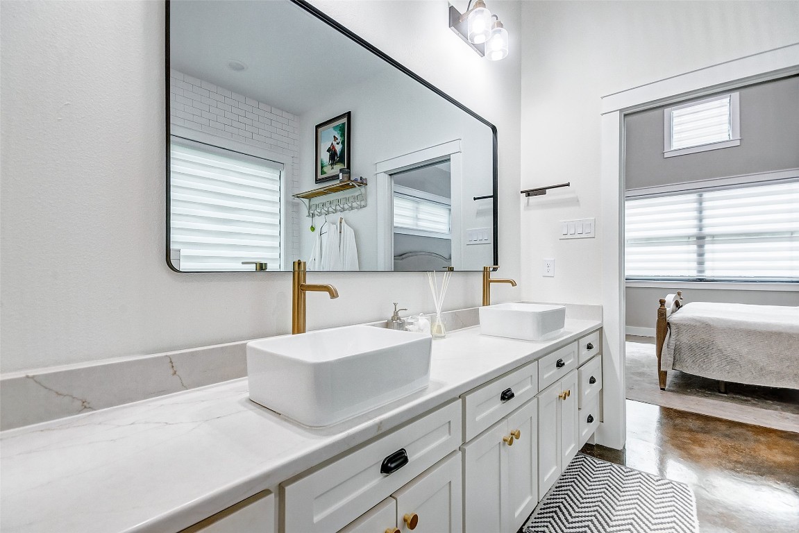 1345 Fm 3277 Livingston, TX 77351 - Photo 26 of 35 a bathroom with double vanity and a mirror