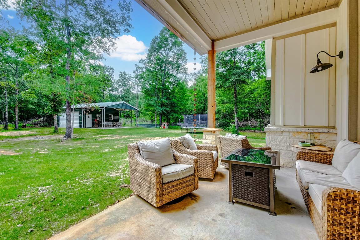 1345 Fm 3277 Livingston, TX 77351 - Photo 28 of 35 a outdoor living space with furniture and garden view