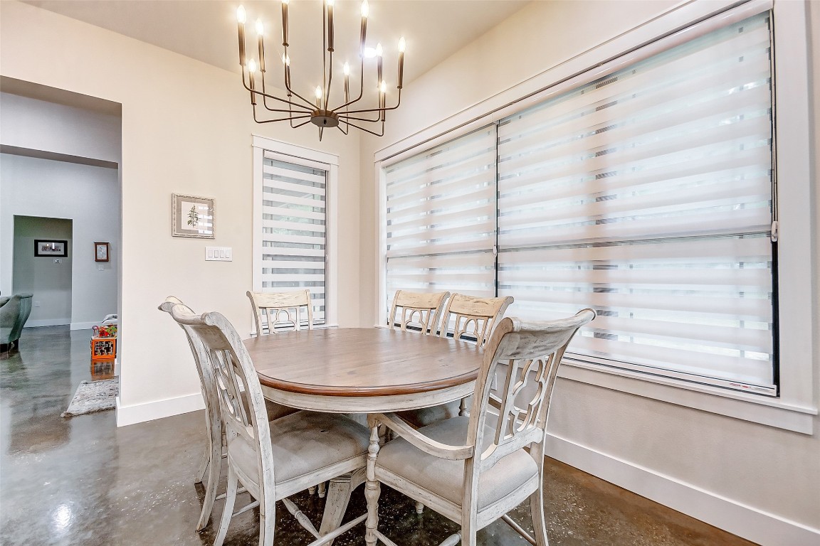 1345 Fm 3277 Livingston, TX 77351 - Photo 6 of 35 a view of a dining room with furniture and a chandelier