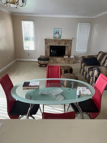 a room with furniture and a window