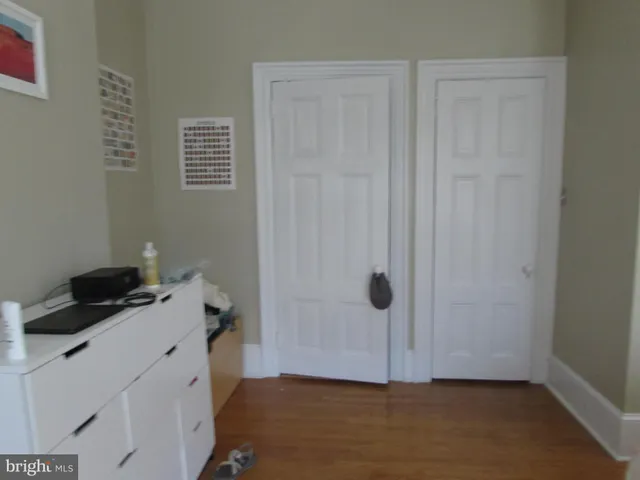 a view of a storage & utility room with a window
