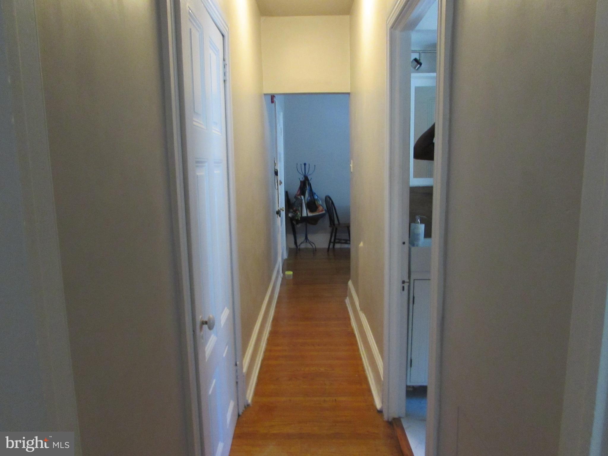 5903 Greene Street Philadelphia, PA 19144 - Photo 5 of 14 a view of a hallway with a livingroom and a hallway