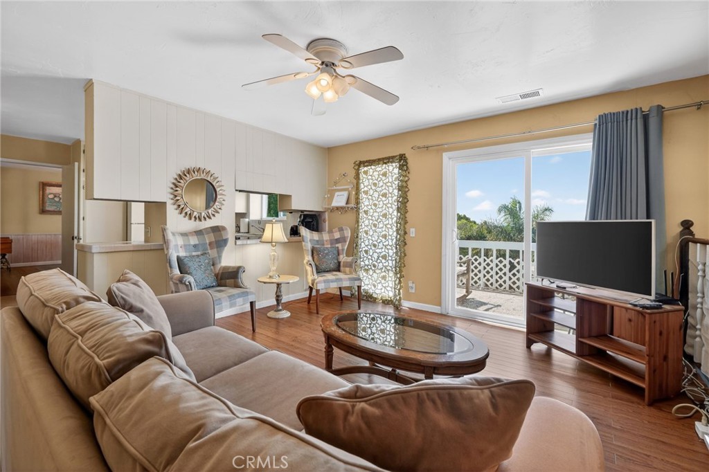 10079 West Lilac Road Escondido, CA 92026 - Photo 11 of 50 a living room with furniture and a flat screen tv