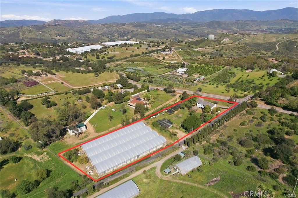 10079 West Lilac Road Escondido, CA 92026 - Photo 39 of 50 an aerial view of residential houses with outdoor space