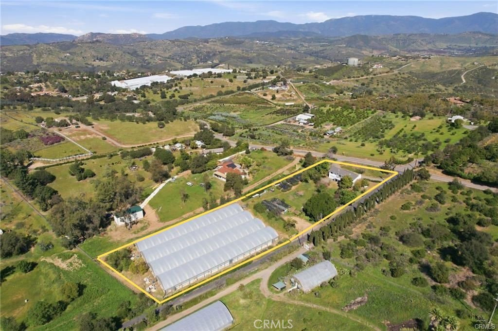 10079 West Lilac Road Escondido, CA 92026 - Photo 40 of 50 an aerial view of residential houses with outdoor space