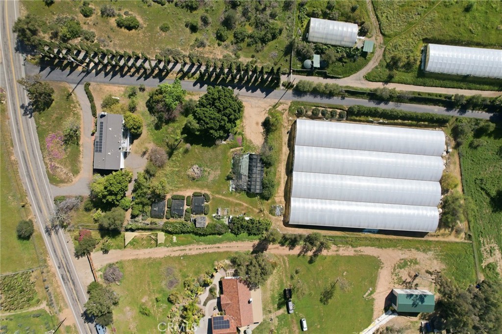 10079 West Lilac Road Escondido, CA 92026 - Photo 42 of 50 an aerial view of a house with a yard basket ball court