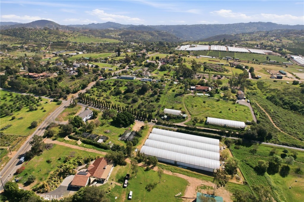 10079 West Lilac Road Escondido, CA 92026 - Photo 44 of 50 an aerial view of residential houses with outdoor space