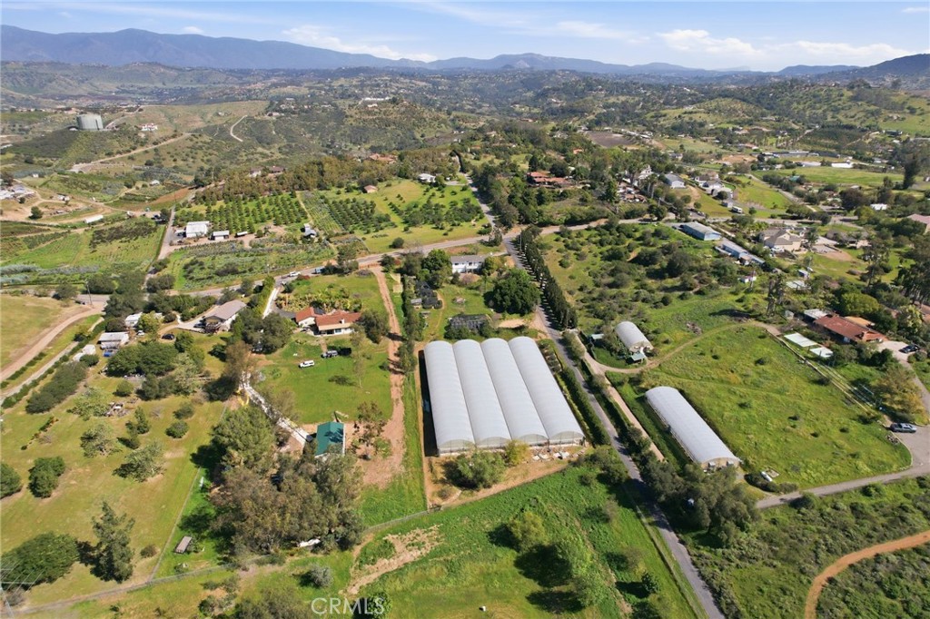 10079 West Lilac Road Escondido, CA 92026 - Photo 45 of 50 an aerial view of residential houses with outdoor space and trees