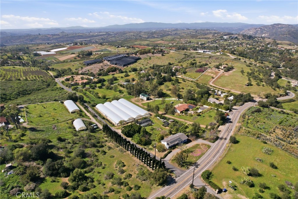 10079 West Lilac Road Escondido, CA 92026 - Photo 47 of 50 an aerial view of residential houses with outdoor space