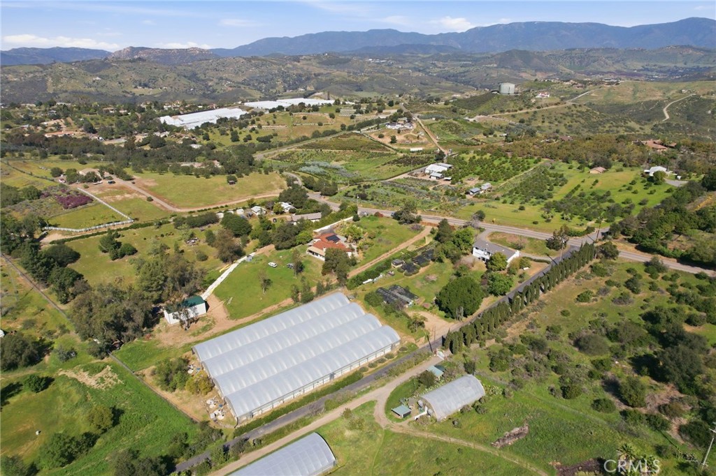 10079 West Lilac Road Escondido, CA 92026 - Photo 49 of 50 an aerial view of residential houses with outdoor space and trees