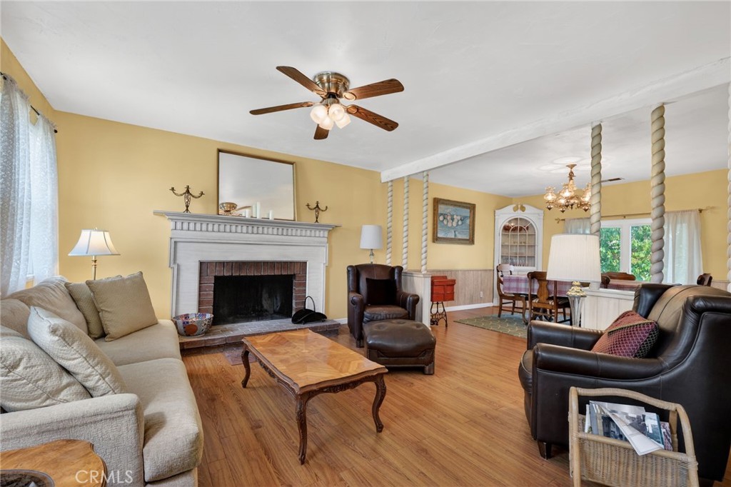 10079 West Lilac Road Escondido, CA 92026 - Photo 10 of 50 a living room with furniture and a fireplace