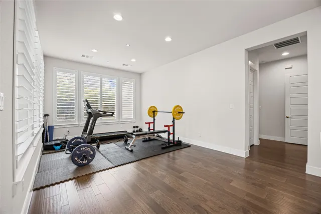 a view of a room with gym equipment