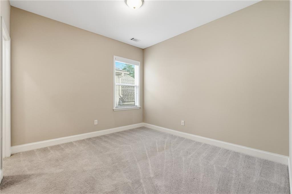 4183 Valtek Court Suwanee, GA 30024 - Photo 26 of 46 an empty room with windows