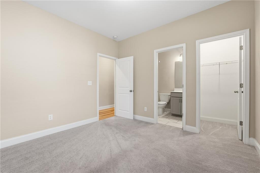 4183 Valtek Court Suwanee, GA 30024 - Photo 27 of 46 an empty room with a bathroom