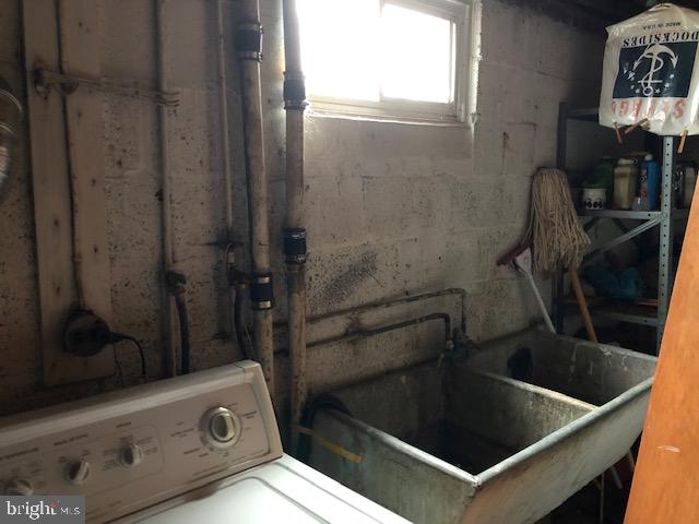 9614 Cottrell Terrace Silver Spring, MD 20903 - Photo 22 of 35 Basement washer/dryer area
