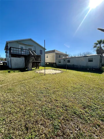 a view of a swimming pool and an outdoor space