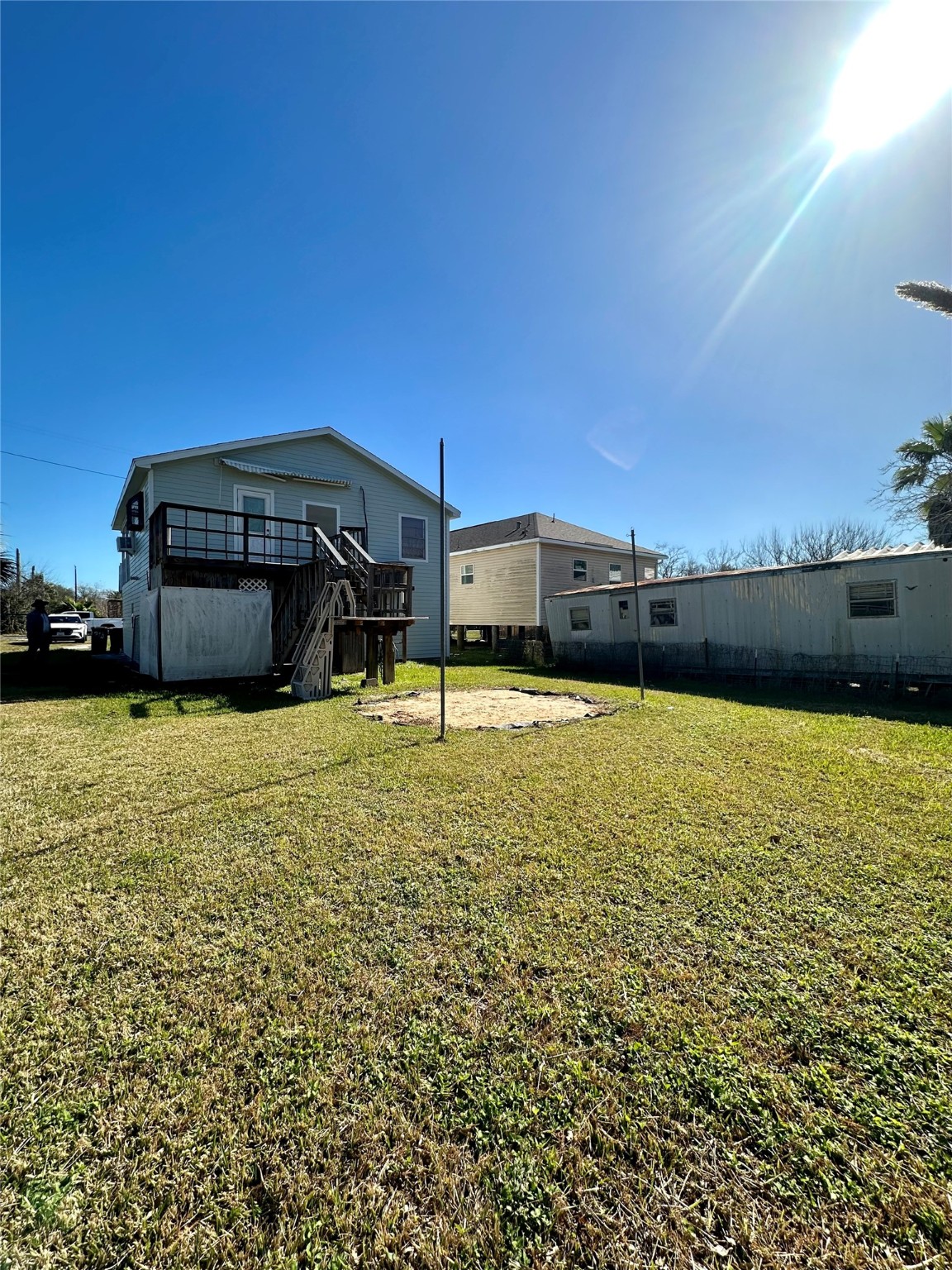 124 7th Street Dickinson, TX 77539 - Photo 17 of 19 a front view of a house with a yard