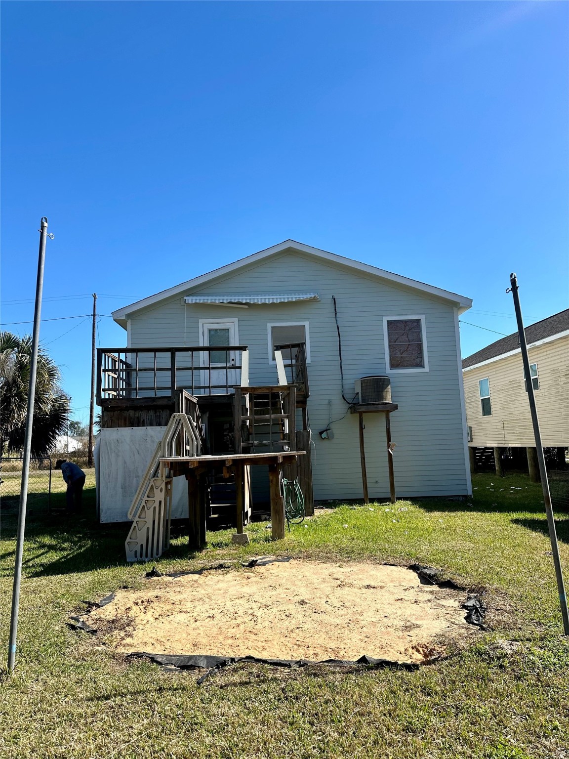 124 7th Street Dickinson, TX 77539 - Photo 19 of 19 a front view of a house with a yard